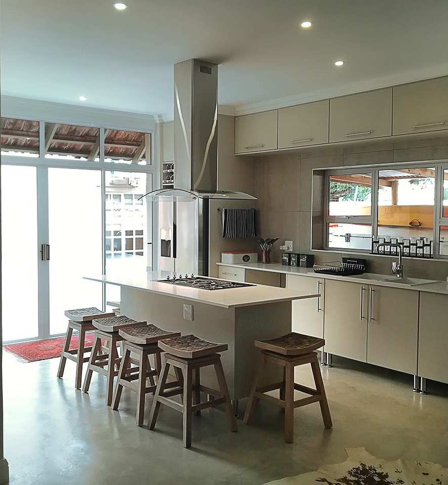 Modern kitchen renovation with elegant cabinetry and countertops